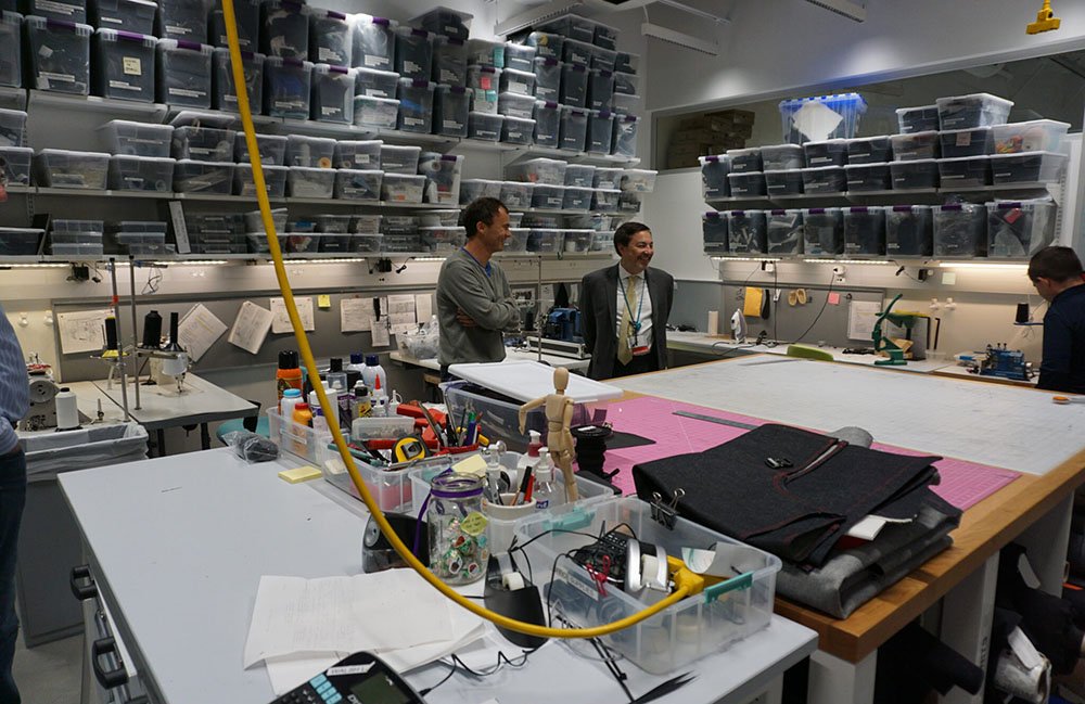 Connor Walsh showing attendees of the “Robotics in Age & Assistive Tech” event around Harvard's Move Lab. 