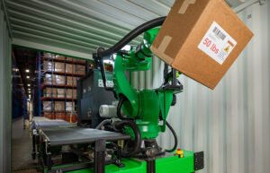 Pickle Robot demonstrates lifting a 50-lb. box in a trailer.